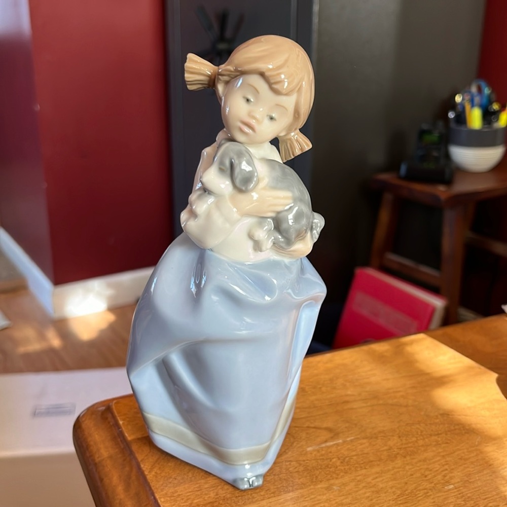 NAO Lladro Girl holding a puppy